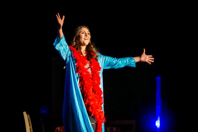 Students perform onstage